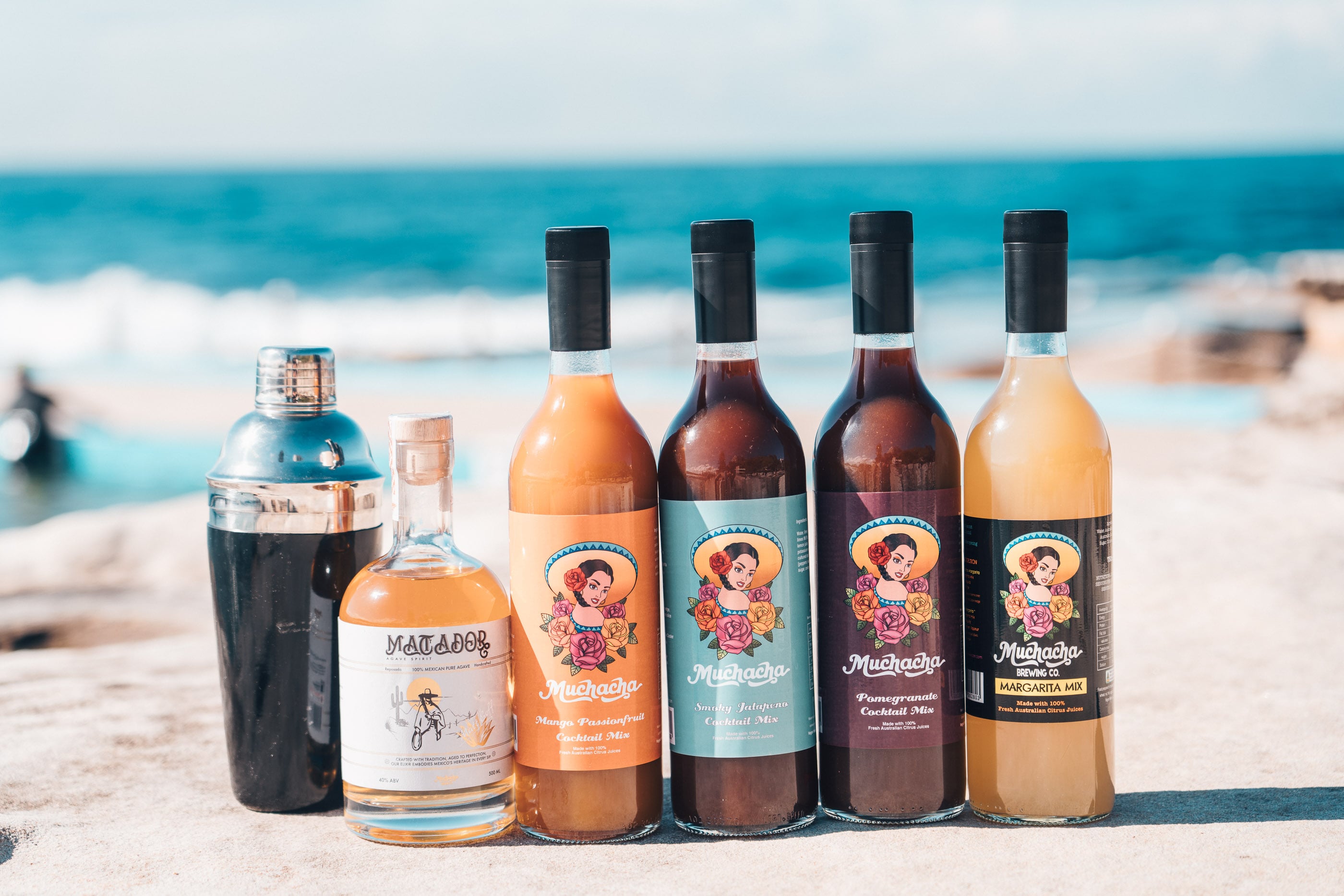 Muchacha Brewing Co. cocktail mixers collection, including Margarita, Smoky Jalapeño, Mango & Passionfruit, and Pomegranate, premium ready-to-mix cocktails in Australia.