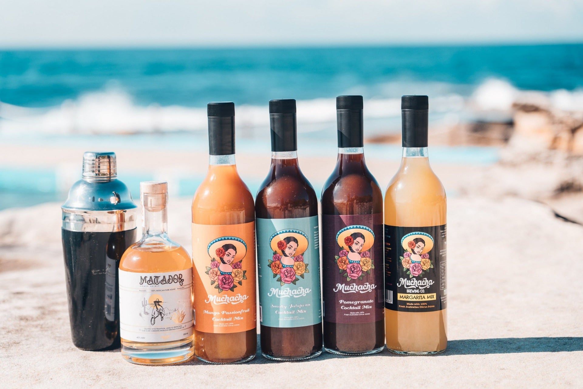 Artisanal cocktail mixers by Muchacha Brewing Co. – classic margarita, mango, pomegranate, and jalapeño flavors.